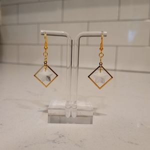 star gem earrings in gold square